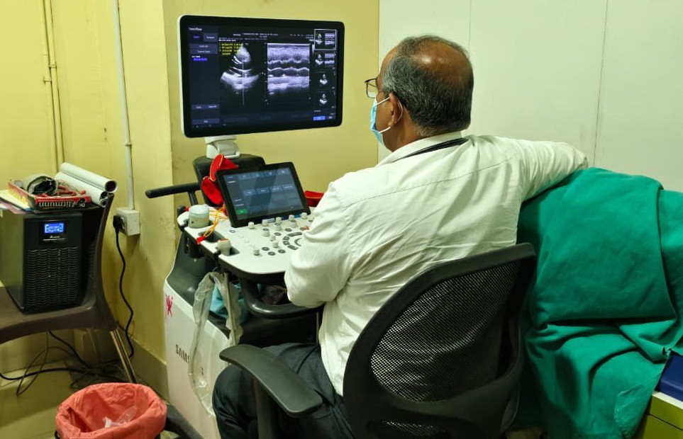Doctor performing echocardiography